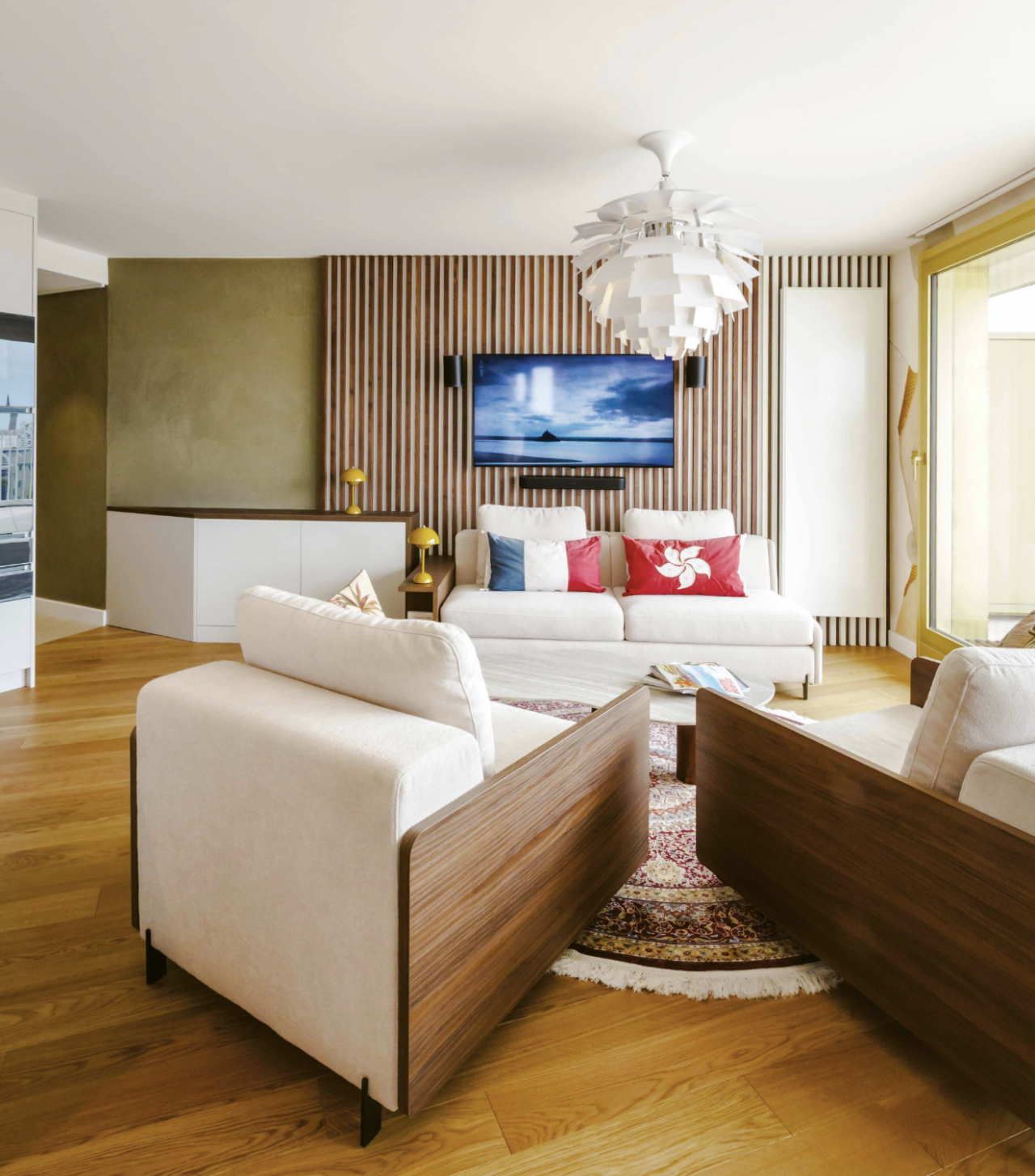 Photo d'un salon illustrant un projet de redistribution et aménagement d'un appartement